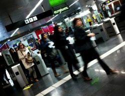 happy commuters passing the gates
