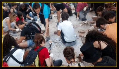 demonstrators prepare bricks to rebuild Can Vies 30 May