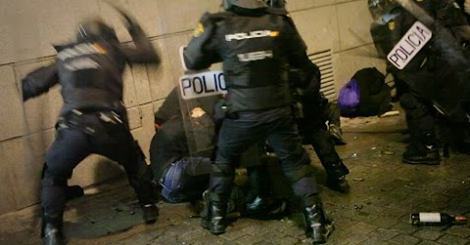 Madrid police politely arresting a member of Straight Edge last March