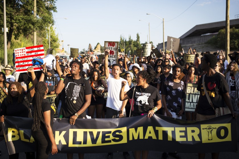 TORONTO, ON- JULY 27 - Uranranebi Agbeyegbe screams into a microphone during a Black Lives Matter protest that marched from Gilbert Avenue to Allen Road on Eglinton Avenue. The protest shut down the southbound Allen Road for around 30 minutes, causing traffic to reverse and exit through Lawrence Avenue. July 27, 2015 Melissa Renwick/Toronto Star