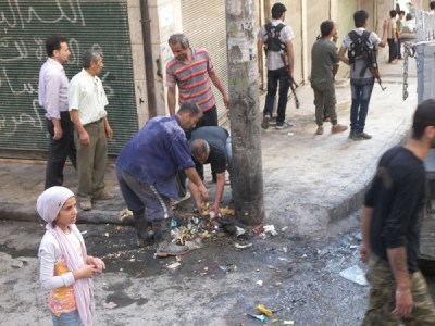 the people of Sheikh Maksoud in Aleppo are conducting a campaign volunteer cleanup in the neighborhood