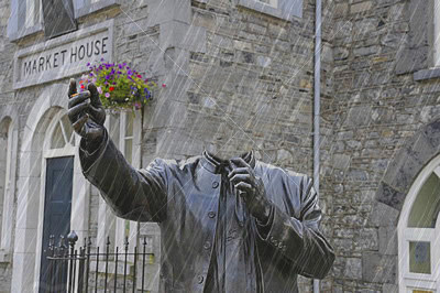 Joe Dolan statue tragically decapitated by turfnado sod. ./Reuters