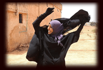 women removed and sometimes burned their burqas after ISIS defeat in Manbij