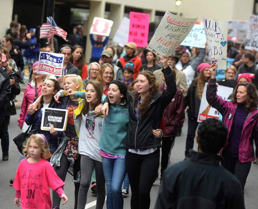 Marchers on Church St. at Saturday's Women's March on Charlotte, N.C., which drew at least 10,000 people according to CMPD. The mile-long march was scheduled to coincide with a national demonstration Saturday, Jan. 21, 2017, in Washington, D.C., the day after Donald Trump's inauguration as president. The march started at First Ward Park, traveled down Tryon Street to 4th St. to Church St. and ended at Romare Bearden Park. "The Women's March on Charlotte is a first step in uniting our communities and in empowering grassroots change," march organizers say on the march's website. "We will work peacefully to send a bold message to our elected leaders that women's rights are human rights." (Diedra Laird/The Charlotte Observer via AP) NYTCREDIT: Diedra Laird/The Charlotte Observer, via Associated Press