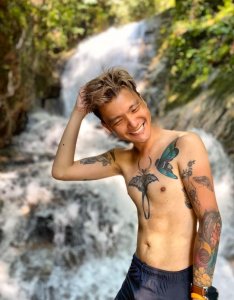 Dr Cyren Wong Chilling at the waterfall in front of our home